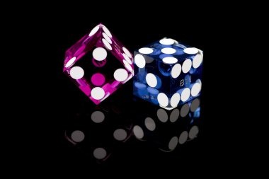koko 303 Boom City live dealer studio showing the physical dice shaker and large interactive grid board